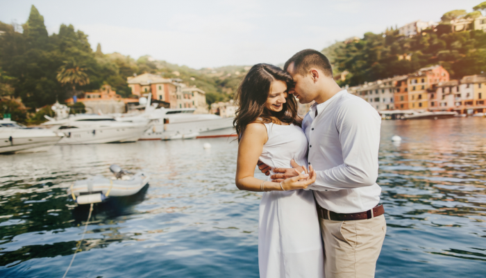 Engaged couple dancing in Positano