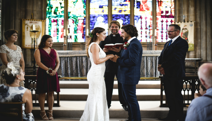 bride and groom on a wedding ceremony in a chapel